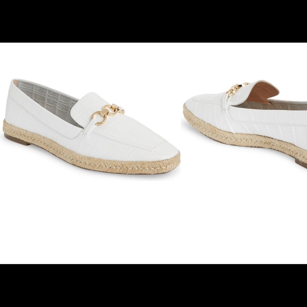 White leather loafers. They’re absolutely gorgeous in person. They fit snug